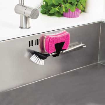 Magnetic holder for brush or sponge