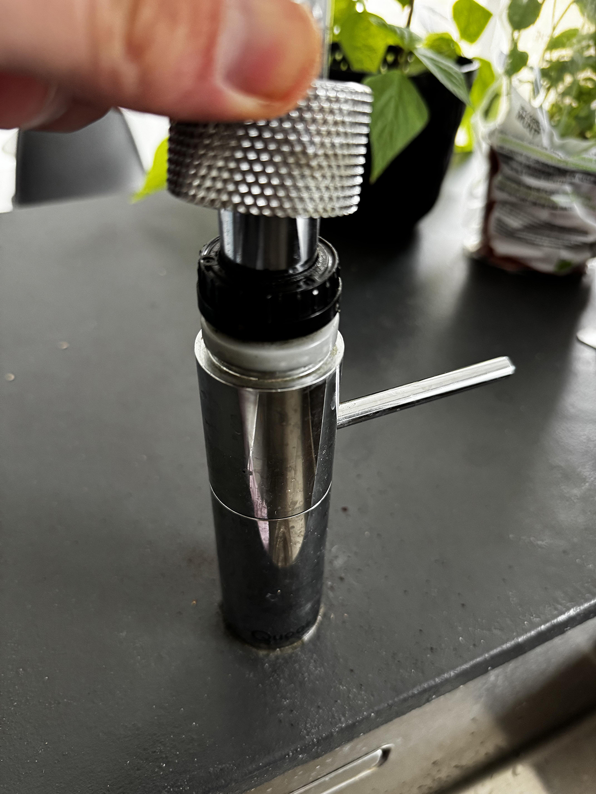 Gently prise off the metal cover